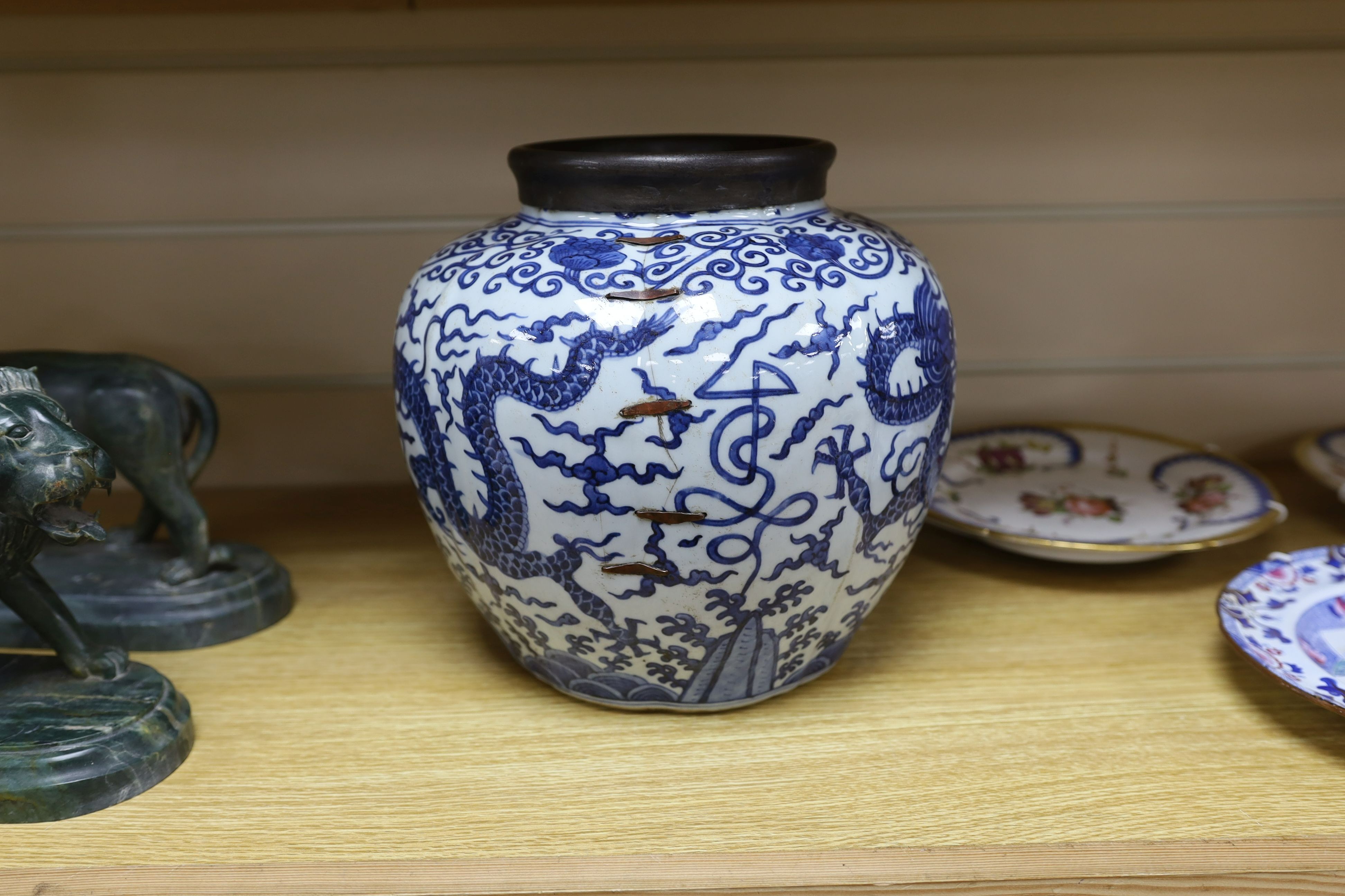 A Chinese blue and white ‘dragon jar, Wanli mark and possibly of the period, 23 cm high